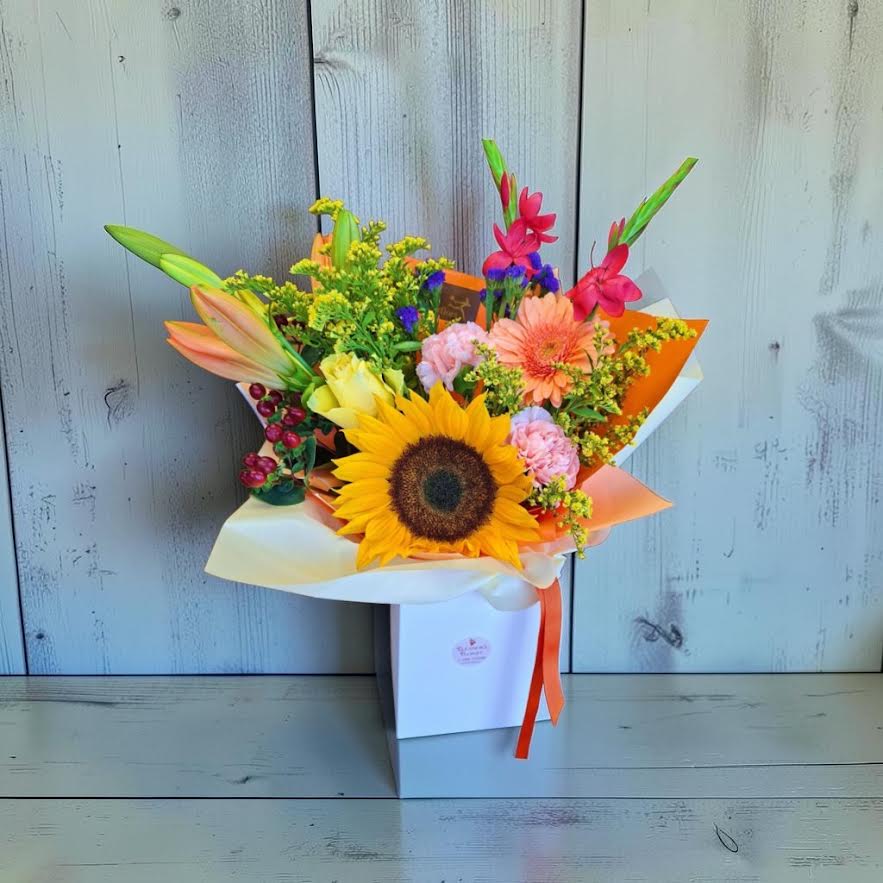 Autumn vibrant Hand tied flowers in the petite gift box