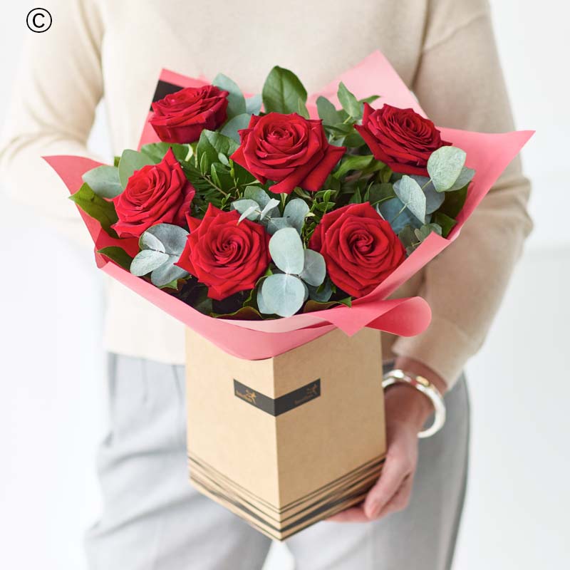 A gorgeous gift box of six luxurious red roses. A classic bloom that's iconic for a reason.