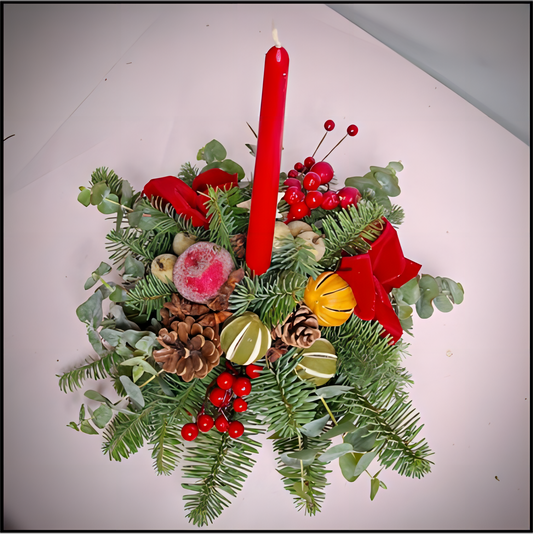 Silent_Night_Table_Centre with a single candle with dried and fresh Christmas decoration.
